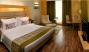 Deluxe Room - The Raintree Hotel